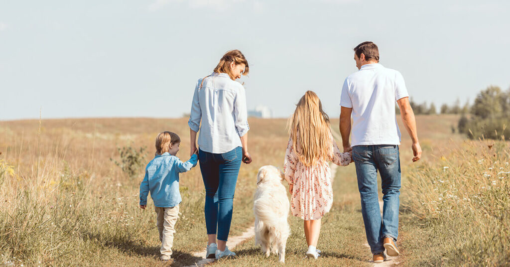 Stopping unauthorized sellers - family of four taking a walk outside