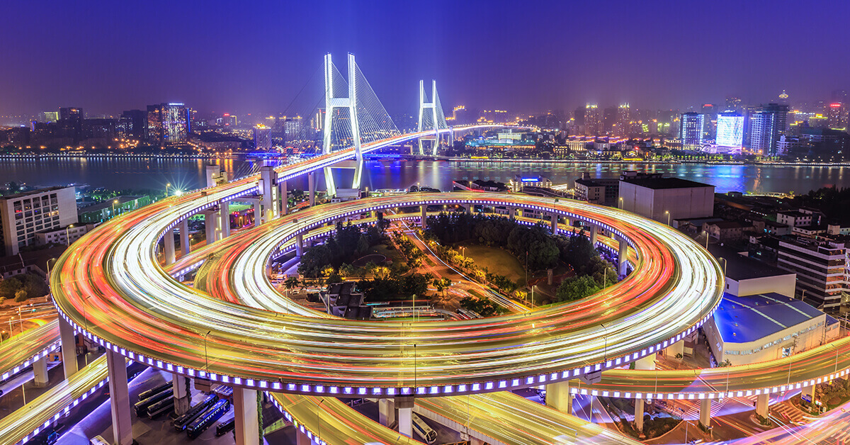 eControl China - Chinese cityscape and infrastructure with highway and bridge into major city