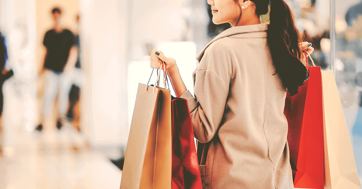 MAP holiday considerations - shopper carrying retail bags